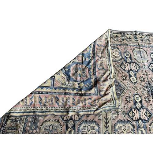 2079 - An antique Tekke rug fragment, 144 x 123cm and a machined Caucasian style panel, 253 x 138cm