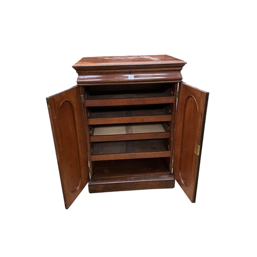 2082 - A mid Victorian rosewood press cupboard, with sliding trays, enclosed by a pair of doors, width 84cm... 