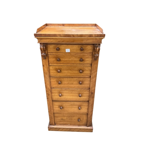 2083 - A mid Victorian satin birch Wellington chest, fitted seven drawers, with a side locking bar, width 6... 
