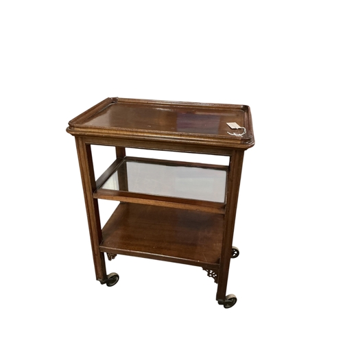 2086 - A tea trolley with removable tray top, width 44cm, depth 66cm, height 85cm and two children's toys... 