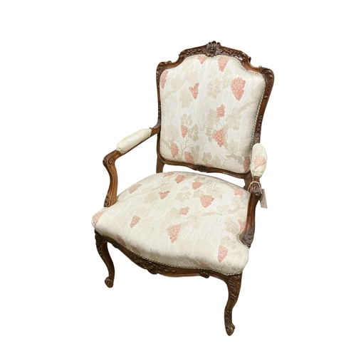 2089 - A pair of early 20th century walnut fauteuils, width 67cm, depth 55cm, height 102cm