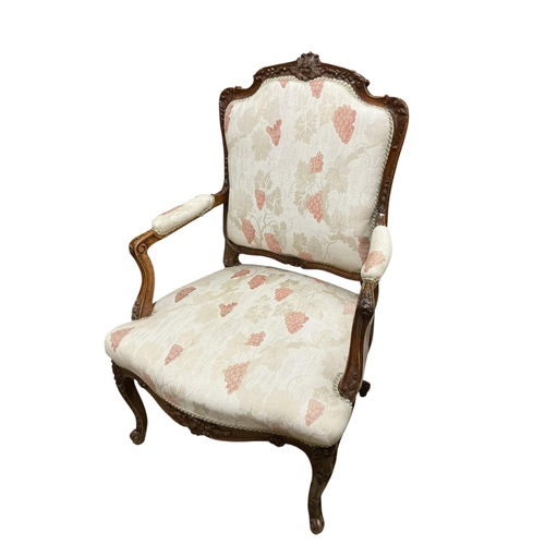 2089 - A pair of early 20th century walnut fauteuils, width 67cm, depth 55cm, height 102cm