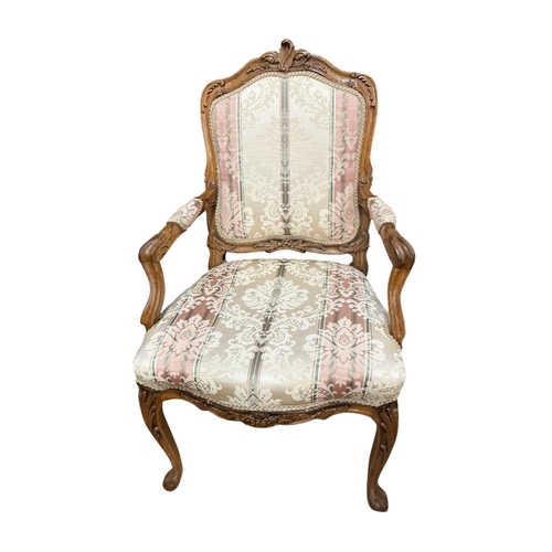 2090 - A pair of early 20th century French walnut fauteuils, width 65cm, depth 50cm, height 103cm