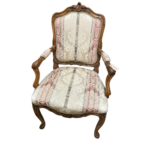 2090 - A pair of early 20th century French walnut fauteuils, width 65cm, depth 50cm, height 103cm