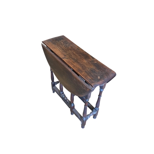 2091 - A small 18th century style oak oval gateleg table, width 69cm, depth 78cm, height 67cm