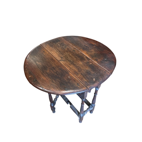 2091 - A small 18th century style oak oval gateleg table, width 69cm, depth 78cm, height 67cm