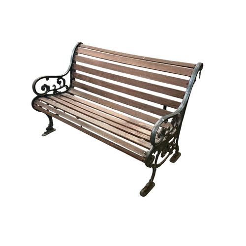 2093 - A Victorian style slatted cast metal garden bench, width 128cm, depth 60cm, height 80cm