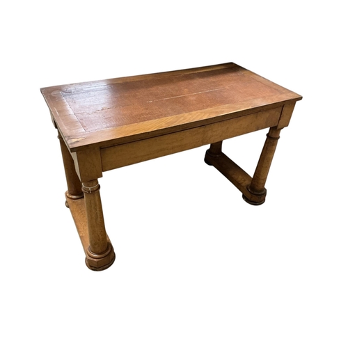 2094 - An early 19th century Biedermeier style bird's eye maple writing table, bears paper label for Consta... 