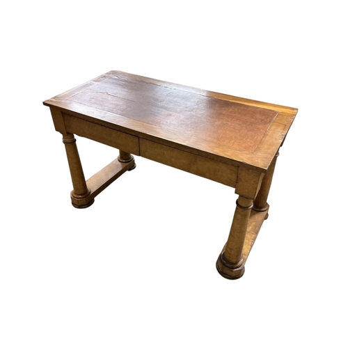 2094 - An early 19th century Biedermeier style bird's eye maple writing table, bears paper label for Consta... 