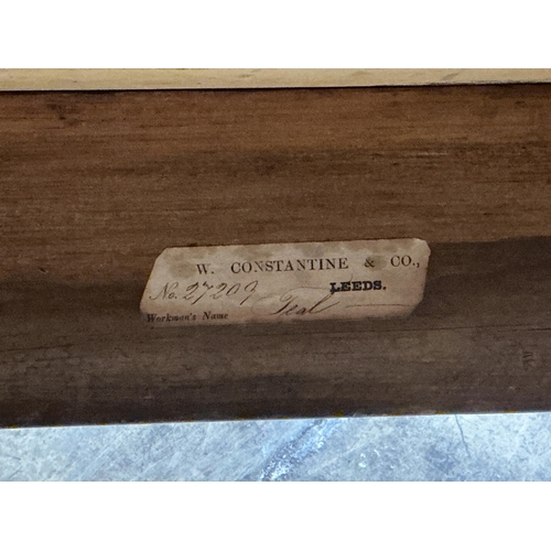 2094 - An early 19th century Biedermeier style bird's eye maple writing table, bears paper label for Consta... 