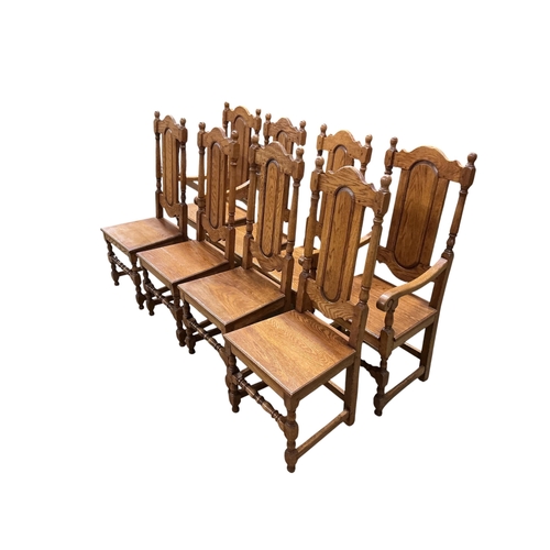 2097 - A set of eight 18th century style panelled oak dining chairs, two with arms, largest width 55cm, dep... 