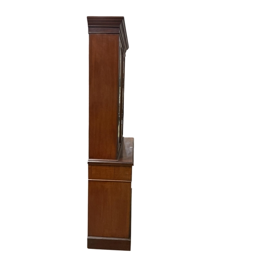 2099 - A late Victorian mahogany bookcase cupboard, width 123cm, depth 45cm, height 226cm