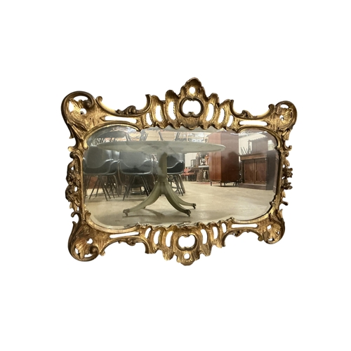 2107 - A 19th century giltwood and composition mirror, later painted, width 105cm, height 85cm