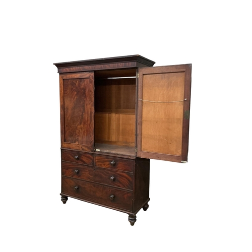 2113 - A Regency mahogany linen press (converted to a hanging wardrobe), width 130cm, depth 55cm, height 20... 