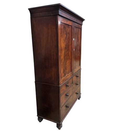 2113 - A Regency mahogany linen press (converted to a hanging wardrobe), width 130cm, depth 55cm, height 20... 