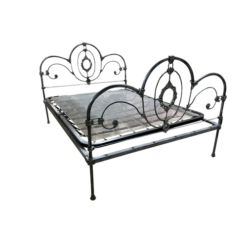 2114 - A wrought iron king size bed frame, length 212cm, width 153cm, height 127cm