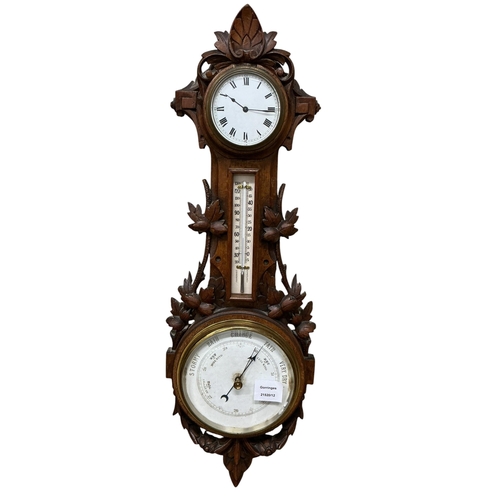 2115 - A late Victorian carved mahogany aneroid barometer, incorporating a clock and a thermometer, height ... 