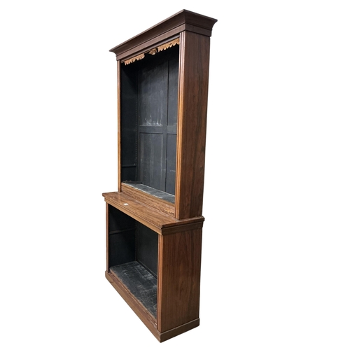 2118 - A Victorian rosewood open bookcase, in two sections, width 127cm, depth 40cm, height 234cm