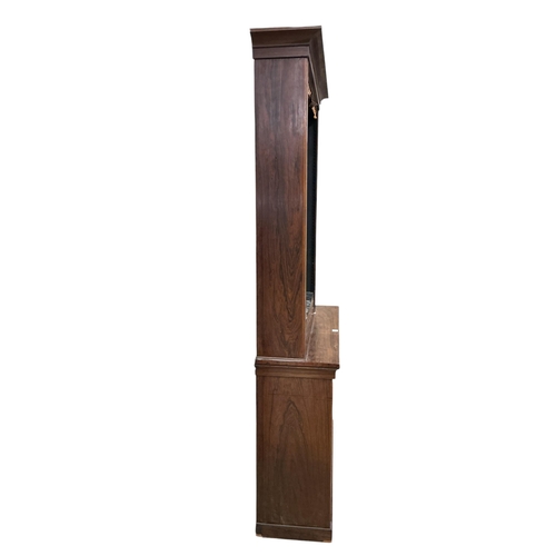 2118 - A Victorian rosewood open bookcase, in two sections, width 127cm, depth 40cm, height 234cm