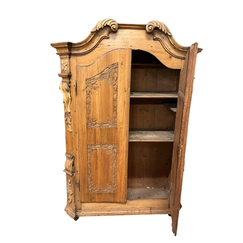 2119 - A 19th century Tyrolean style pine armoire, width 133cm, depth 54cm, height 191cm