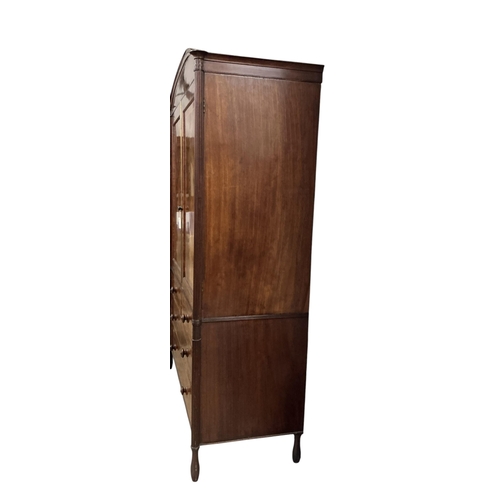 2123 - A George IV banded mahogany linen press, width 142cm, depth 53cm, height 228cm