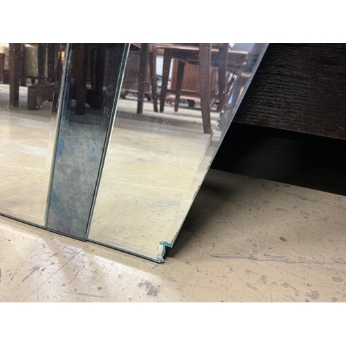 2130 - An Art Deco green and clear glass frameless mirror, width 107cm, height 75cm (a.f.)