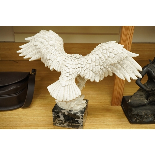 2274 - A composition figure of an eagle, indistinctly signed, raised on marble base, 34cm high
