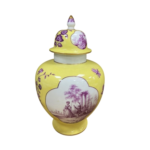 2275 - A Meissen style yellow ground porcelain jar and cover, 20th century, of baluster form, hand painted ... 