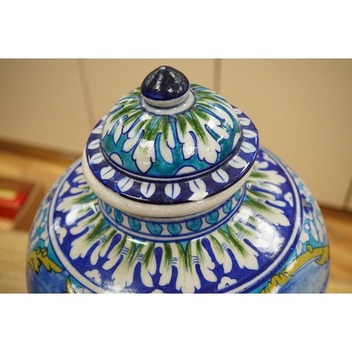 2280 - A Persian glazed pottery baluster jar and cover on associated hardwood stand, 41cm high