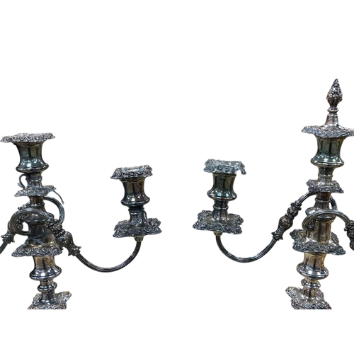 2283 - A pair of early 20th century silver plated twin branch, three light candelabra, 54cm high