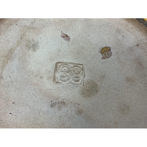 2284 - A Biot ochre glazed terracotta dinner service to include soup bowls, dinner plates and a centre bowl... 