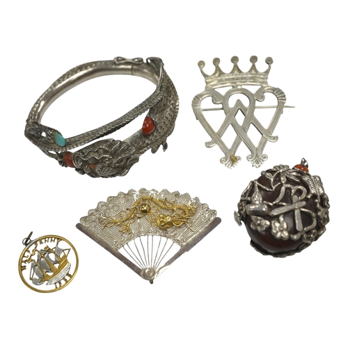 2922 - A Chinese white metal and gem set hinged bangle, a similar fan brooch and three other items.