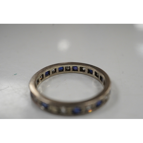 2989 - An unmarked white metal, sapphire and diamond set full eternity ring, size U, gross weight 4.6 grams... 