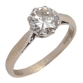 A diamond solitaire ring, circa 1980, claw-set with a brilliant-cut ...
