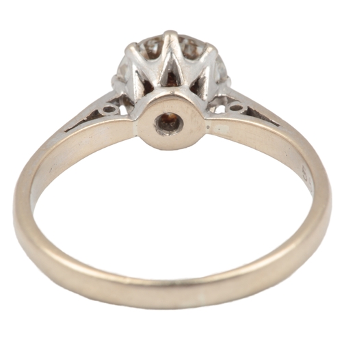 A diamond solitaire ring, circa 1980, claw-set with a brilliant-cut ...