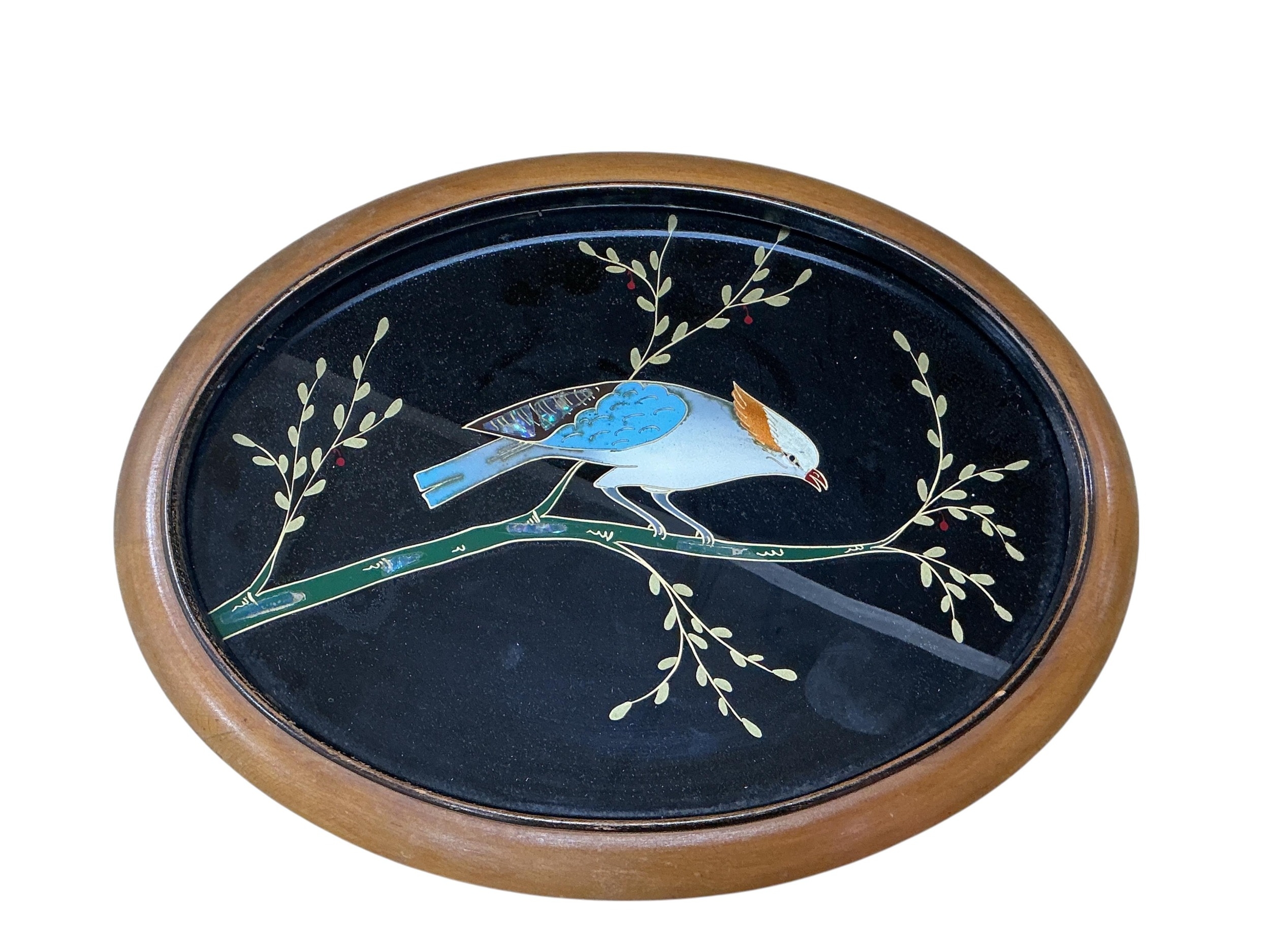 An abalone shell-inlaid oval panel depicting a bird among flowering ...