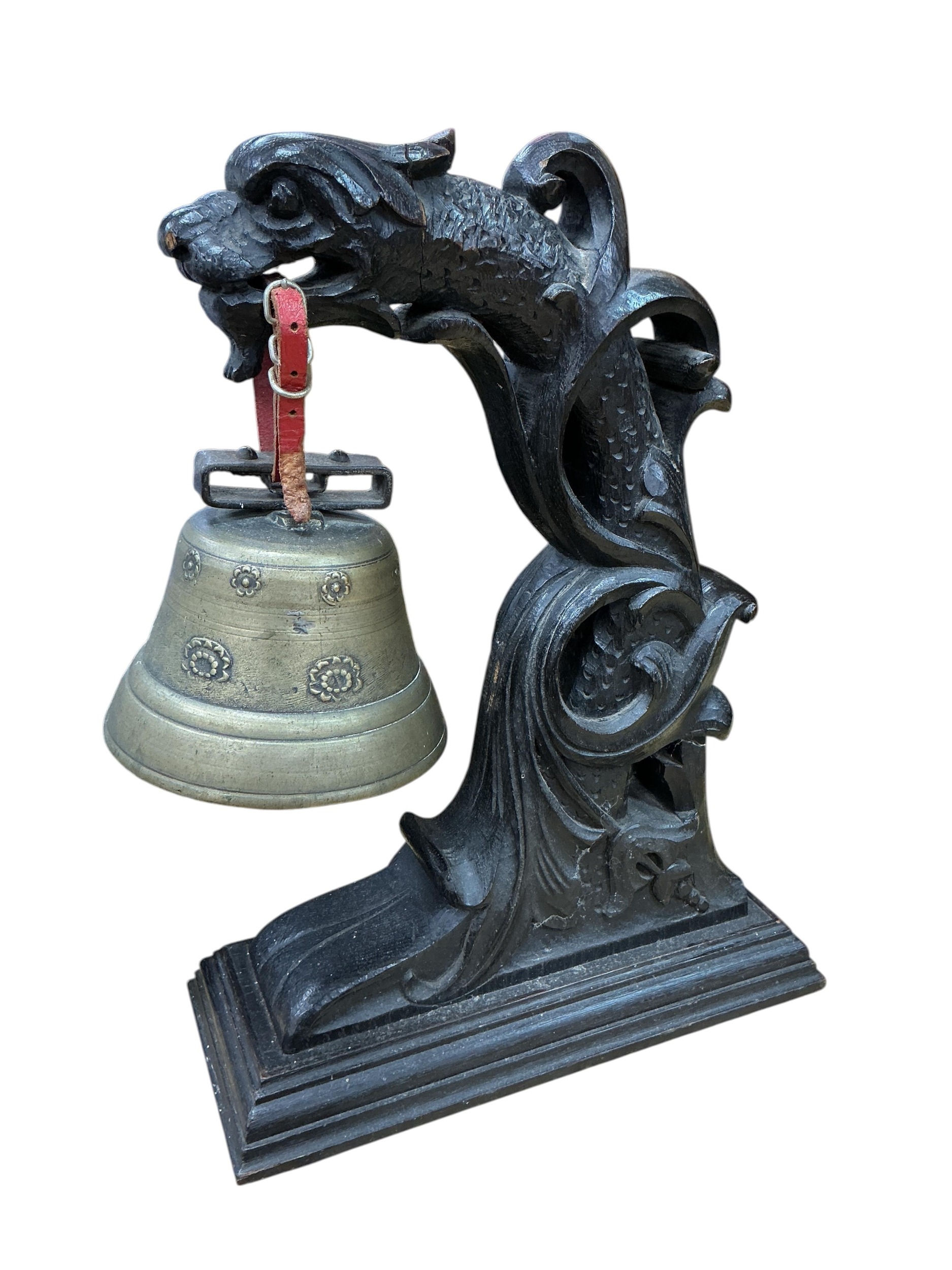 A Chinese carved hardwood and bronze dragon temple bell, height 40cm