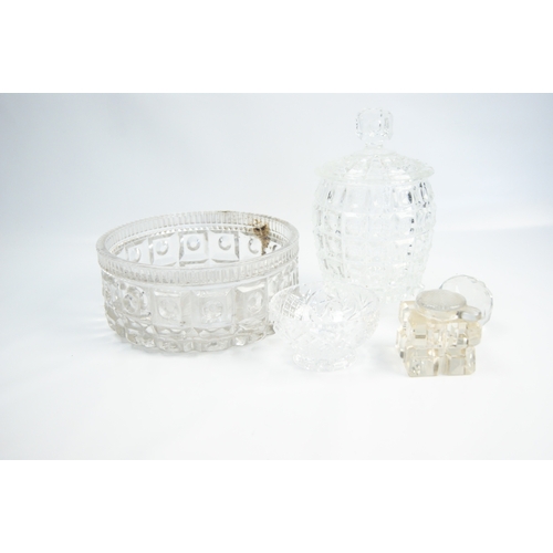 98 - A Collection of Decorative Cut and Moulded GlasswareA collection of clear and tinted decorative gl... 