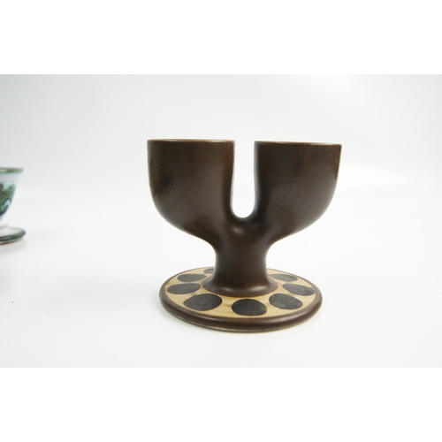 64 - A Collection of Ceramic and Porcelain Egg Cups including a Troika Double Egg CupA collection of ce... 