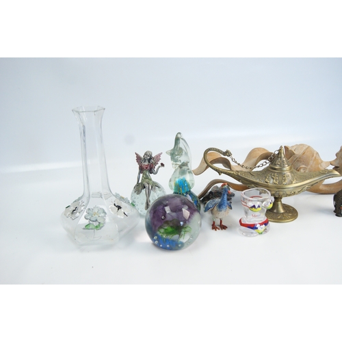 77 - A Collection of Decorative Glassware, Metalware, and Curiosities including a Genie-Style LampA col... 