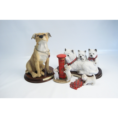 85 - A Collection of Leonardo Collection Painted Resin Dog FigurinesA collection of painted resin dog-t... 