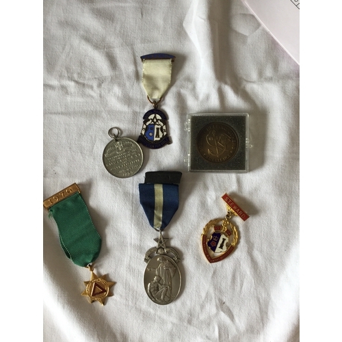 15 - Of Masonic interest: A silver jewel,
together with a small collection of other medals and jewels -