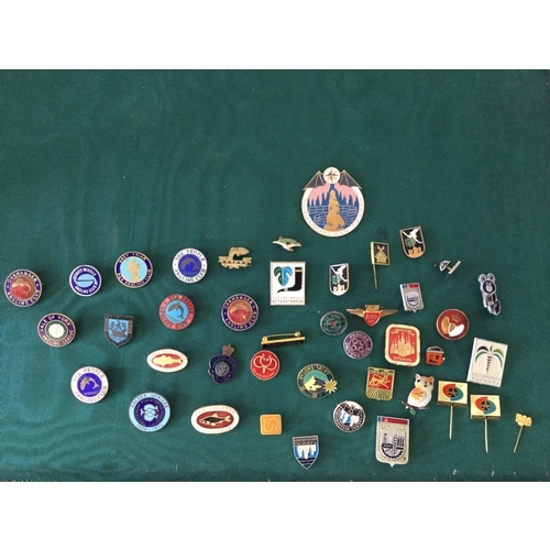 19 - A small group of enamel and other badges,
including many of fishing interest -