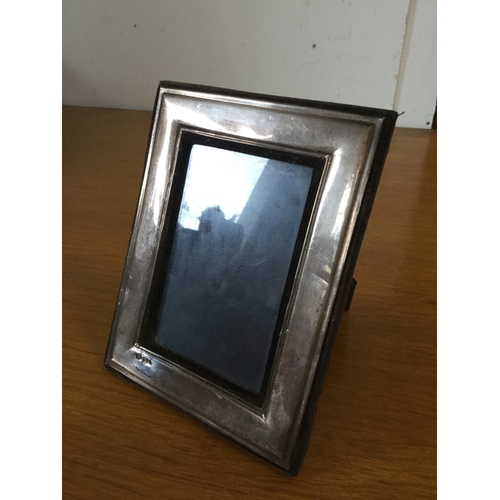 24 - A silver faced photograph frame,
London 1985 -