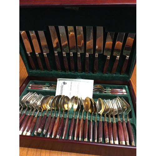 33 - A cased canteen of cutlery -