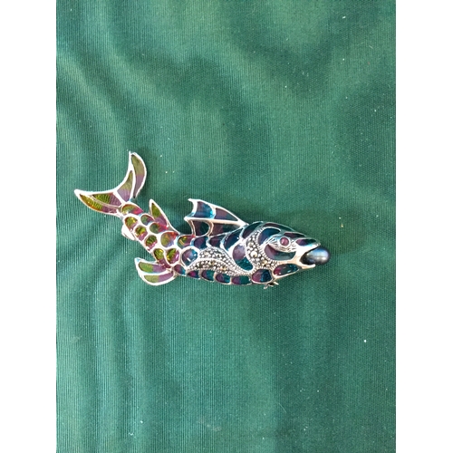 43 - A silver brooch, designed as a fish,
with plique a jour enamel -