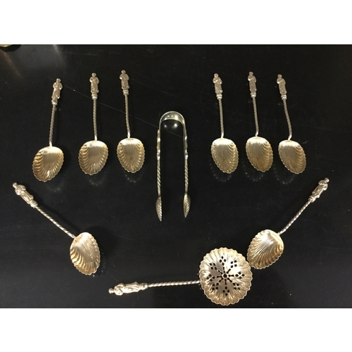 54 - A set of eight Apostle spoons,
with matching tongs and strainer spoons, Birmingham 1896 -