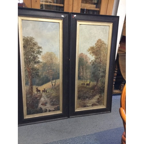 134 - A pair of early 20th century rural scenes,
each featuring stag and deer in a forest clearing, oil on... 