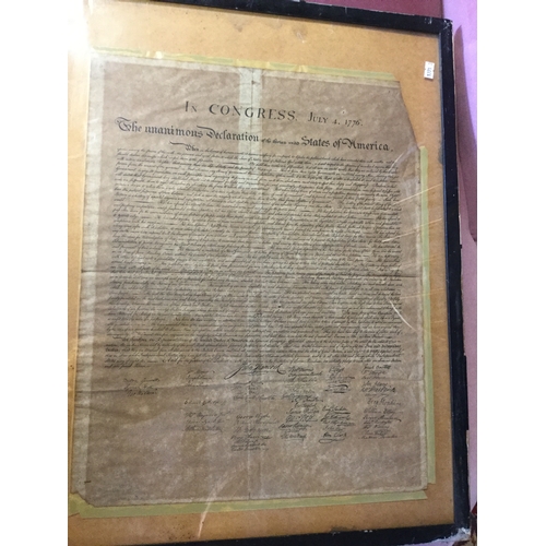 135 - An old copy of the Declaration of Independence,
framed -