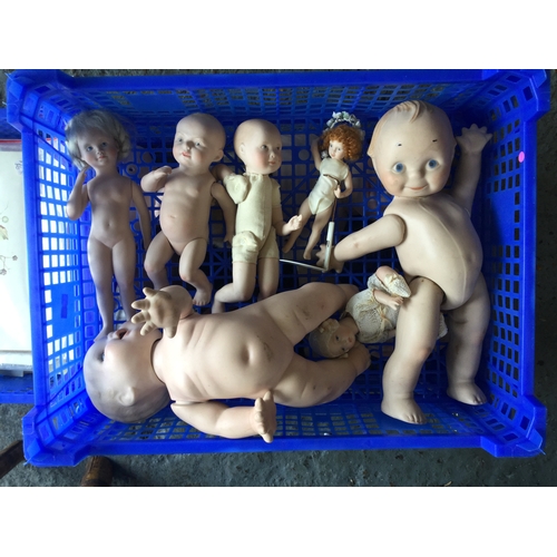 293 - A large quantity of dolls,
doll parts, bisque heads, dolls clothes etc -